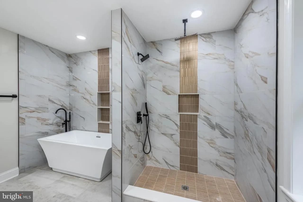 Long Green Pike bathroom with a freestanding tub and a separate walk-in shower