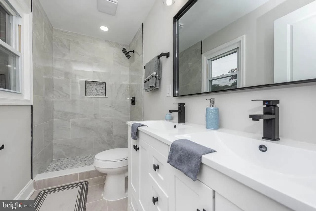 Beavers Court bathroom with a wide vanity and shower